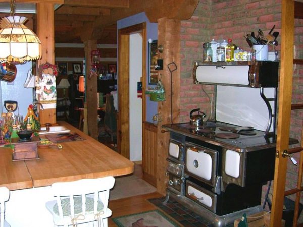 log home with antique wood stove