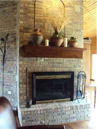 handcrafted pottery as fireplace mantle decorations