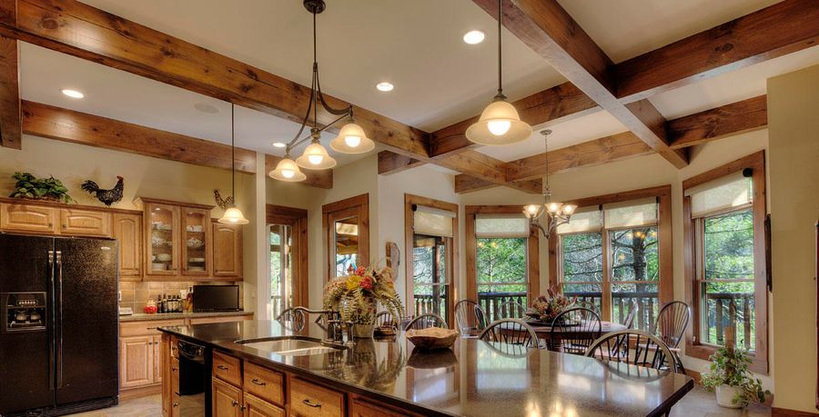 log home lighting in a beautiful kitchen area