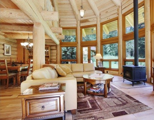 Pendant light fixture that is too small for this large great room in a log home