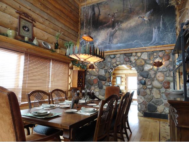 wldlife dinnerware on table in elegant log home