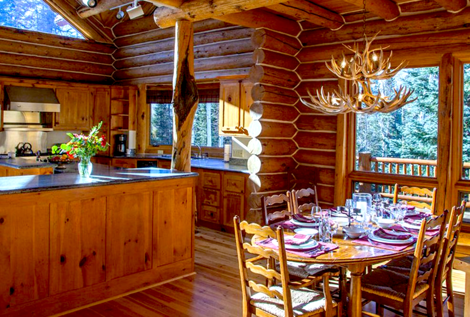 wildlife dinnerware on table in log cabin