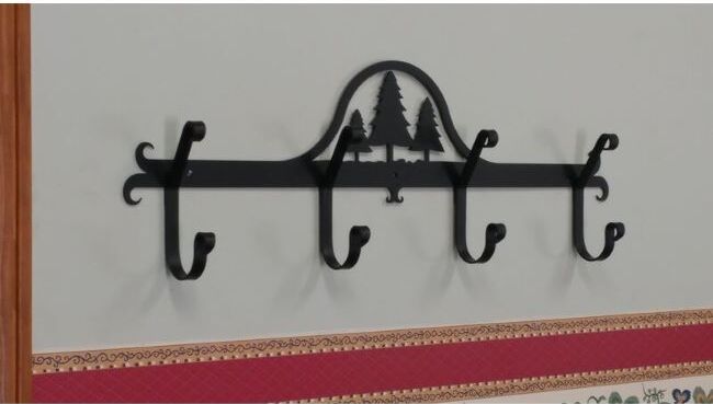 Karissa wall mounted coat rack with pine trees and 4 hooks