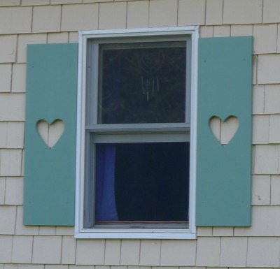 heart cutouts in aqua colored shutters