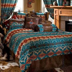 Turquoise Chamarro comforter on bed
